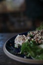 Quinoa salad with vegetable on wooden table Royalty Free Stock Photo