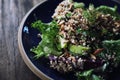 Quinoa salad with vegetable on wooden table Royalty Free Stock Photo