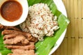 quinoa sticky rice eat couple with salty pork strips and savory sauce on banana leaf