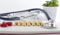 QUINSY word made with building blocks, medical concept background