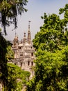 Quinta da Regaleira palace vertical view, hidden in the trees, in Sintra, Portugal