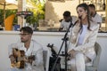 Band duo singer and guitar player in beach bar restaurant Royalty Free Stock Photo