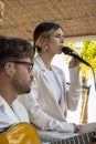 Band duo singer and guitar player in beach bar restaurant Royalty Free Stock Photo
