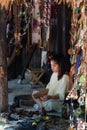 Young girl making handicrafts at a local mayan community