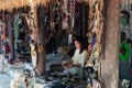 Young girl making handicrafts at a local mayan community