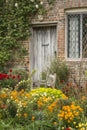 Quintessential vibrant English country garden scene landscape wi