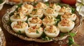 A quintessential picnic staple deviled eggs displayed on a platter garnished with paprika and parsley