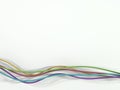 Quintet of Brightly Colored Cables or Strings on a White Background