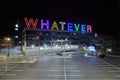 Large `WHATEVER` illuminated sign in Auckland, New Zealand