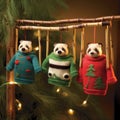 Quirky And Festive Tv Panda Sweater-themed Ornaments For A Whimsical Christmas Royalty Free Stock Photo