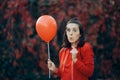 Funny Woman with Paper Party Glasses and Red balloon