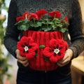 Humorous And Quirky Charm: Knitted Pansy Planter With Ugly Christmas Sweater Inspiration