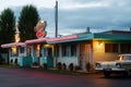 quirky roadside motel with retro decor, quirky rooms and a neon sign