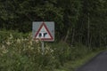 Quirky Scottish road sign showing a traditional Beltie cow