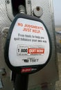 Quit Now quitting tobacco signage on gas pump