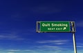 Quit Smoking - Freeway Exit Sign Royalty Free Stock Photo
