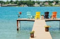 Quite dock with colorful chairs and decorations Royalty Free Stock Photo