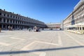 Quite empty Saint Mark`s Square Piazza San Marco and arcade of procuracies Procuratie Vecchie in Venice, Italy