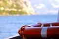 Lifebuoy, mountains, travel insurance Royalty Free Stock Photo