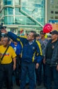 Quito, Ecuador - April 7, 2016: Closeup opposition leader Andres Paez surrounded by people, police and journalists