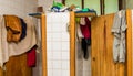 QUITO, ECUADOR, AUGUST 21, 2018: Indoor view of clothes in a bathroom inside of a refuge for Venezuelan people that
