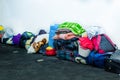 QUITO, ECUADOR, AUGUST 21, 2018: Pile of colorful clothes, bags and accessories in the ground of a room inside of a