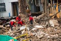 Quito, Ecuador - December 09, 2016: An unidentified group of firemans, cleaning the damage area and destruction, debris