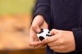 Quito, Ecuador - February 10, 2017: Fidget Cube stress reliever manipulated Royalty Free Stock Photo