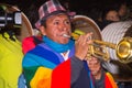 Quito, Ecuador - february 02, 2016: An unidentified man playing his instrument during popular town celebrations