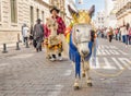 Quito, Ecuador - January 11, 2018: Outdoor view of unidentified people wearing colorful clothes and a donkey with a