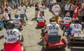 QUITO, ECUADOR - JANUARY 31, 2018: Unidentified boys racing a wooden car in the streets of city of Quito, back view