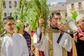 QUITO, ECUADOR- MARCH 23, 2018: Outdoor view of unidentified people and priest holding in hands a megaphone and Royalty Free Stock Photo