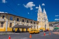 QUITO, ECUADOR - MARZO 23, 2015: Large and imposing church covered by a great sky. Beige and yellow dominated the