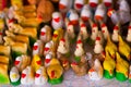 QUITO, ECUADOR- 07 MAY, 2017: Beautiful small figures of hens, ducks and swan made of clay over a white table