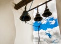 QUITO, ECUADOR - MAY 06 2016: Close up of three huge bells inside of a bulding in the San Francis church in the city of