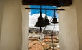 QUITO, ECUADOR - MAY 06 2016: Close up of three huge bells inside of a bulding in the San Francis church, with a town