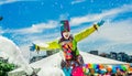 QUITO, ECUADOR- NOVEMBER, 28, 2017: Close up of unidentified person wearing a clown costume surrounding of group of