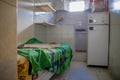 QUITO, ECUADOR - NOVEMBER 23, 2016: Indoor view of old deserted rugged building, room of the prisioners, in the old Royalty Free Stock Photo