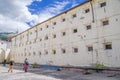 QUITO, ECUADOR - NOVEMBER 23, 2016: Unidentified people taking pictures at indoor in backyard in the old prison Penal
