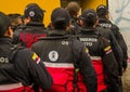 QUITO, ECUADOR - OCTOBER 11, 2017: Close up of back view of woman fireguard at the enter of the Atahualpa stadium