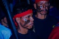 QUITO, ECUADOR - OCTOBER 23, 2017: Close up of young boy with his face painted during Quito Festivities` parade Royalty Free Stock Photo