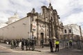 Heavily armed policemen and women guarding the 1766 baroque Jesuit church La Compania Royalty Free Stock Photo