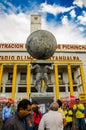 QUITO, ECUADOR - OCTOBER 11, 2017: Unidentified peple walking at outdoors of the Atahualpa stadium at background in