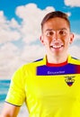 QUITO, ECUADOR -8 OCTOBER, 2016: Young ecuadorian man wearing official Marathon football shirt standing facing camera