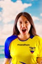 QUITO, ECUADOR -8 OCTOBER, 2016: Young ecuadorian woman wearing official Marathon football shirt standing facing camera