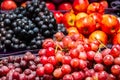 Quito, Ecuador - Red and Black Grapes and Apples at a Market