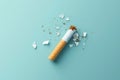 Quitting the Habit: Mangled Cigarette on Light Blue.