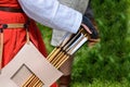 Quiver with arrows for a bow. Box with arrows for a sport bow. Case for carrying arrows Royalty Free Stock Photo