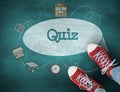 Quiz against green chalkboard