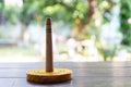 Quoits, wooden toy on wooden texture in bokeh garden background, Selective focus, Close up shot, Game and Recreation for children